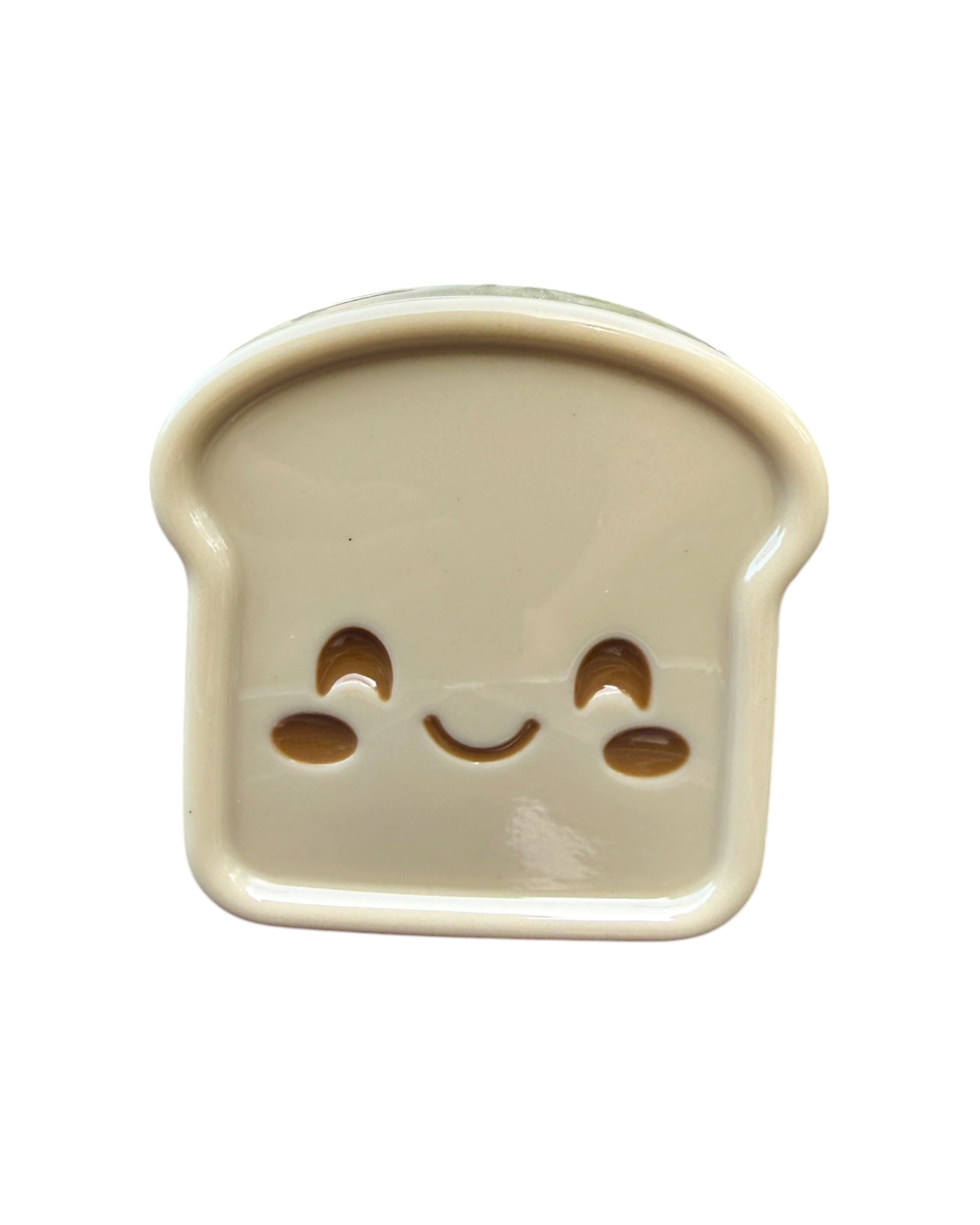 Little Brioche beige de la Cuties Bakery Lolie’z, objet décoratif kawaii en forme de tranche de brioche fabriqué à la main en résine époxy.