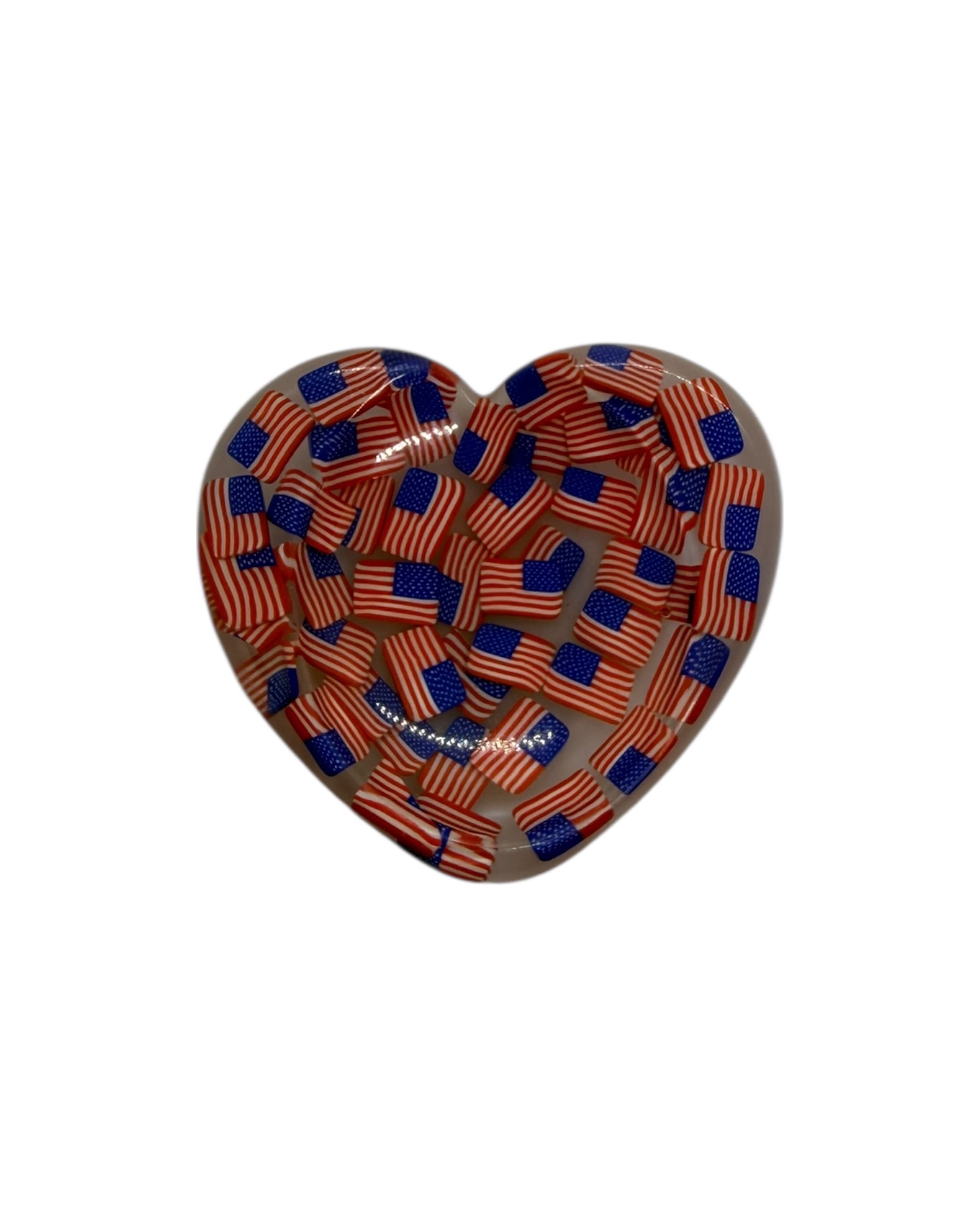 Calma, galet anti-stress en forme de cœur, réalisé à la main en résine époxy, pensé pour un geste apaisant et réconfortant.