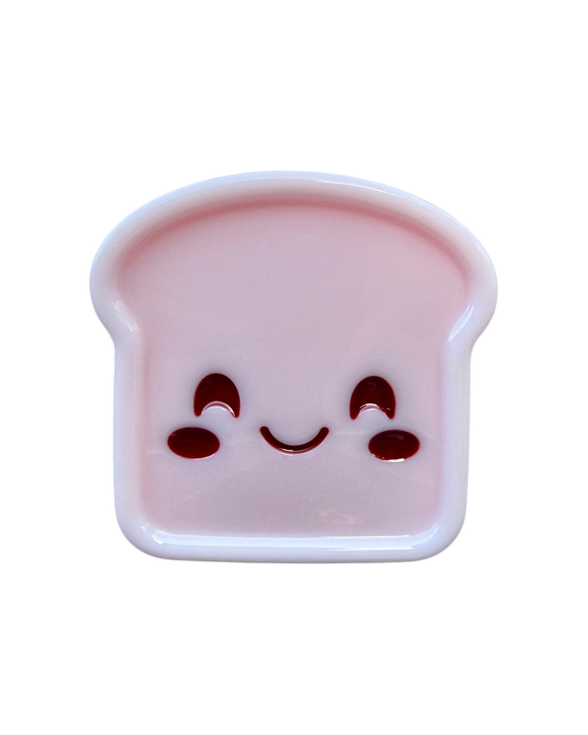 Little Brioche rose de la Cuties Bakery Lolie’z, création décorative en résine époxy avec grands yeux et petit sourire.