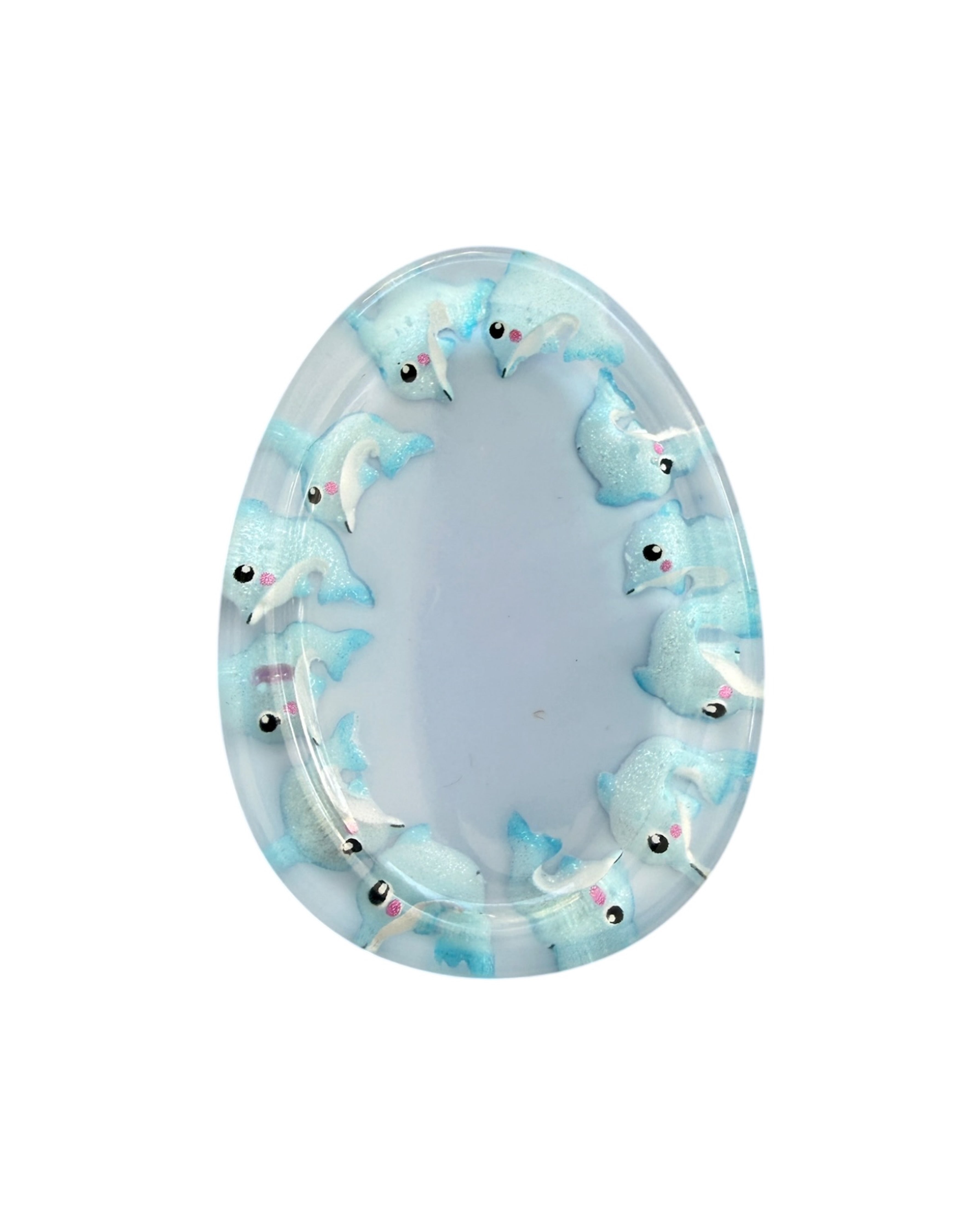 Galet d’apaisement Flow en résine époxy, forme œuf ergonomique conçue pour un geste fluide et apaisant dans la main.