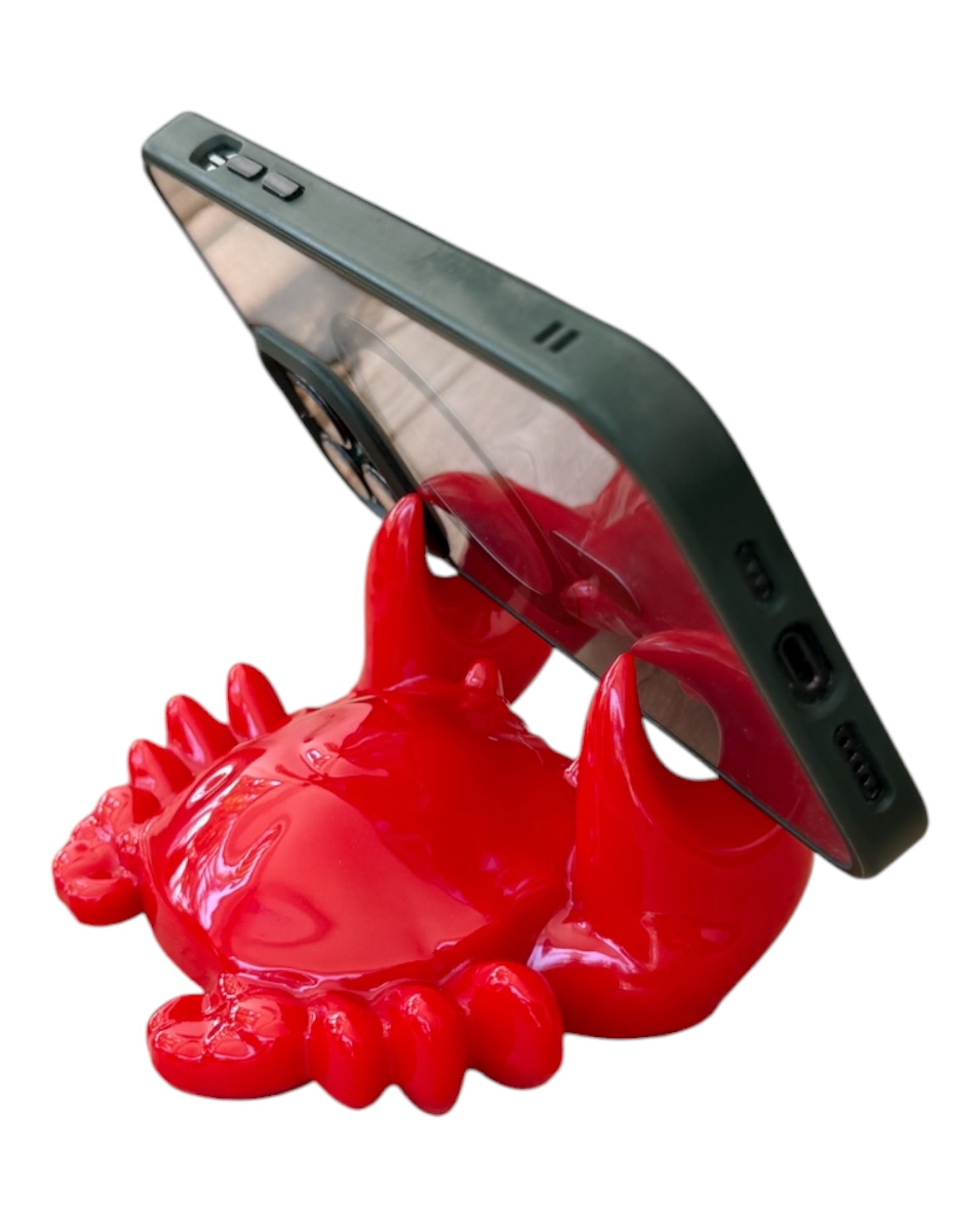 Eddy le crabe utilisé comme repose-stylo sur un bureau, accessoire décoratif en résine époxy fabriqué à la main.