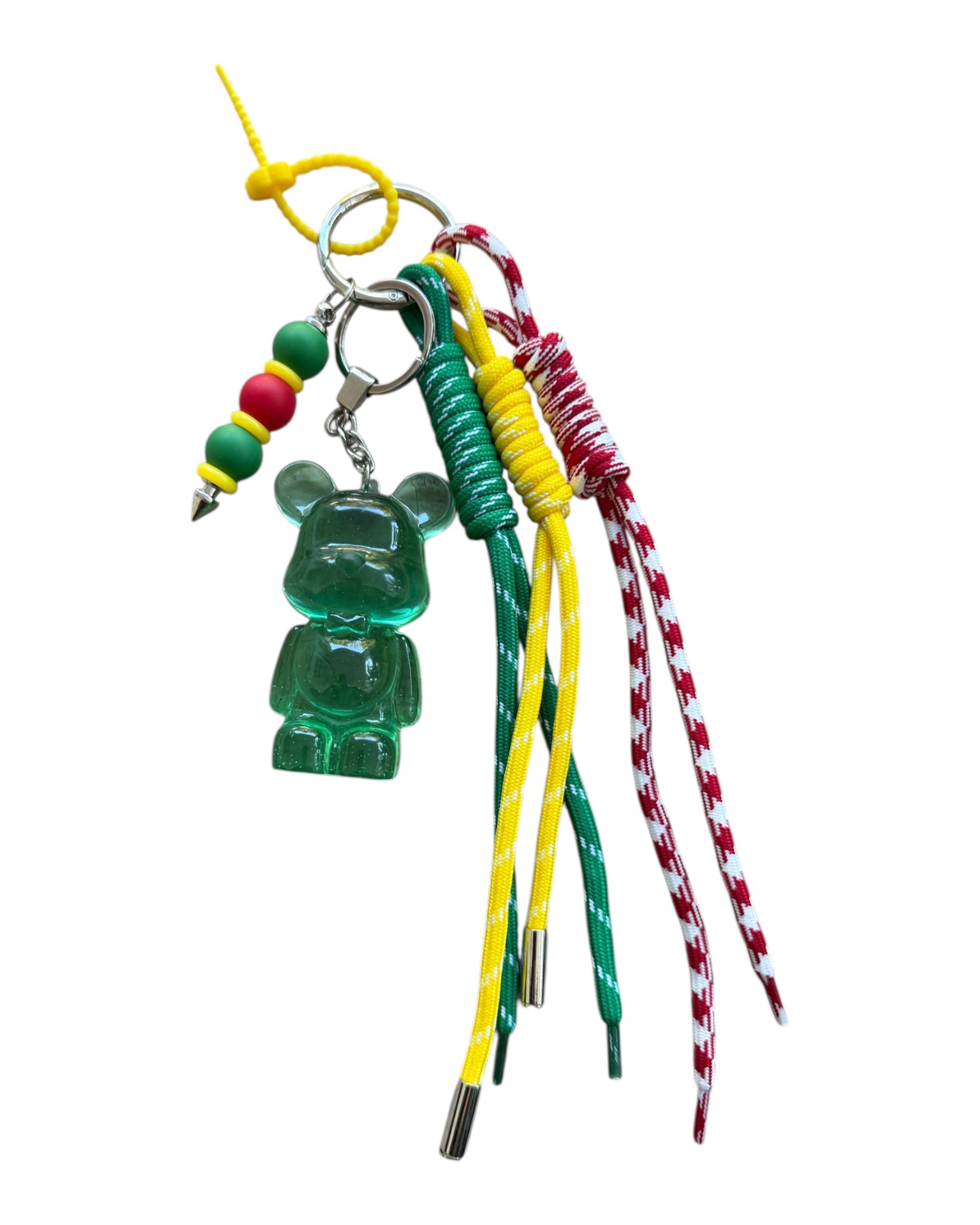 Porte-clés grigri Teddy’z Rasta Pop multicolore en résine époxy avec ours vert translucide, pièce unique artisanale.