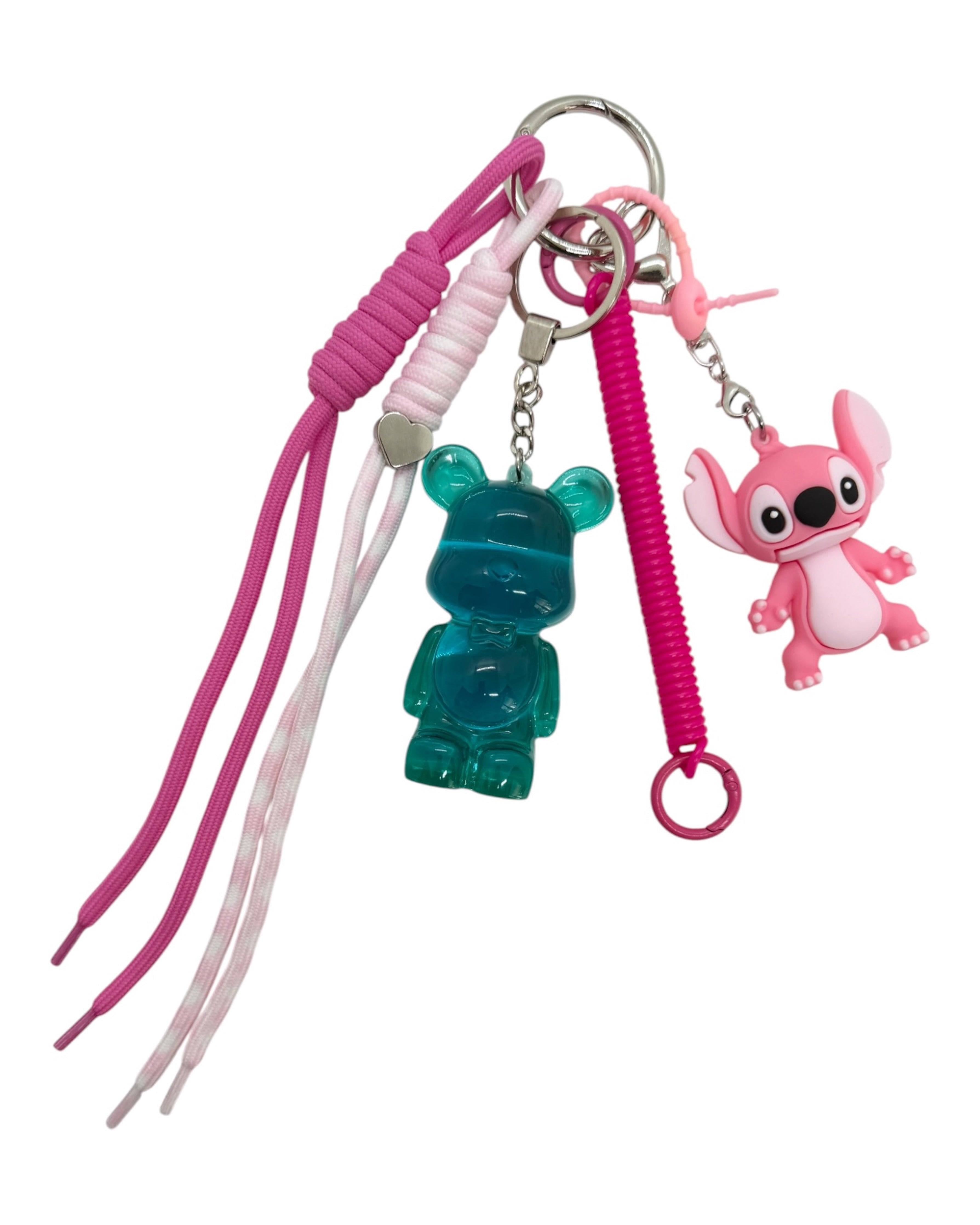Porte-clé Teddy’z bleu translucide avec détails roses et charms inspirés d’un univers tropical