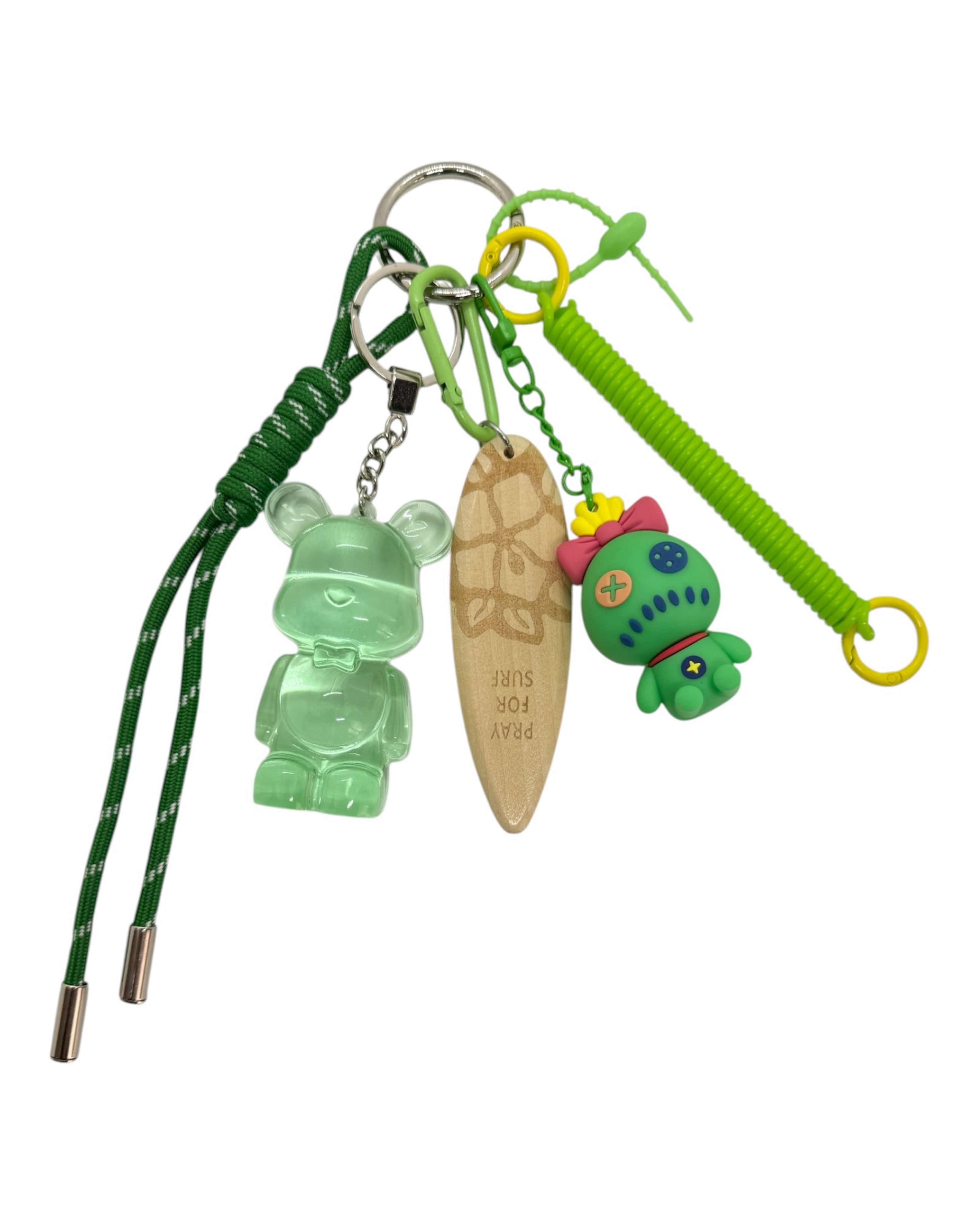 Porte-clé Teddy’z vert translucide avec charms colorés inspirés d’un univers tropical et kawaii