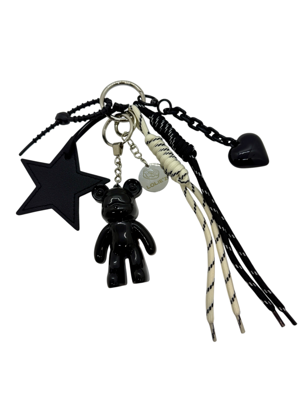 Grigri Urban Ted Bonne Détente – cordons noir et écru, résine noire glossy, bijou de sac fait main Lolie'z