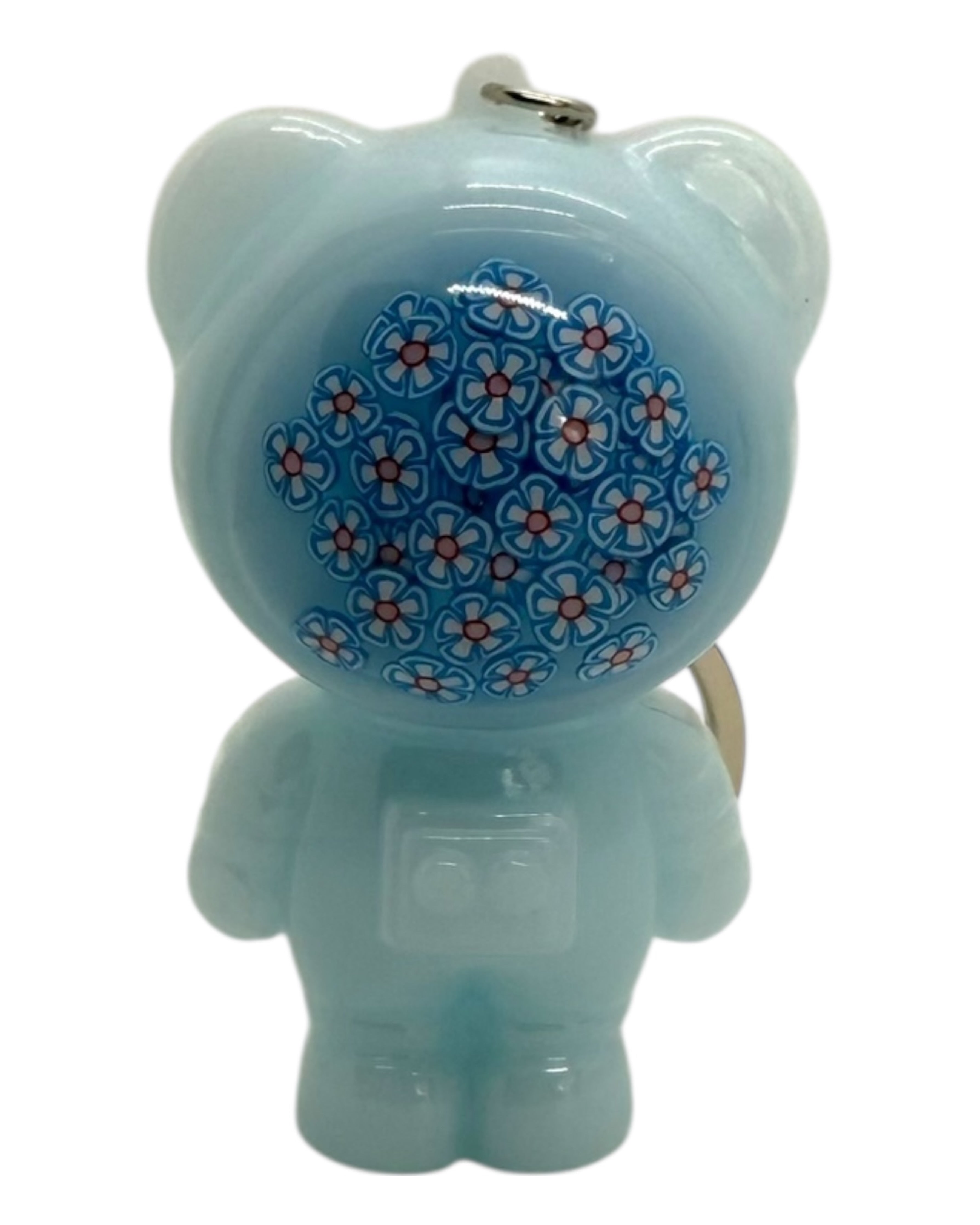 Figurine Izzy Ballroom bleu ciel ornée de fleurs bleues et blanches, un astro bear élégant façonné à la main en résine époxy.