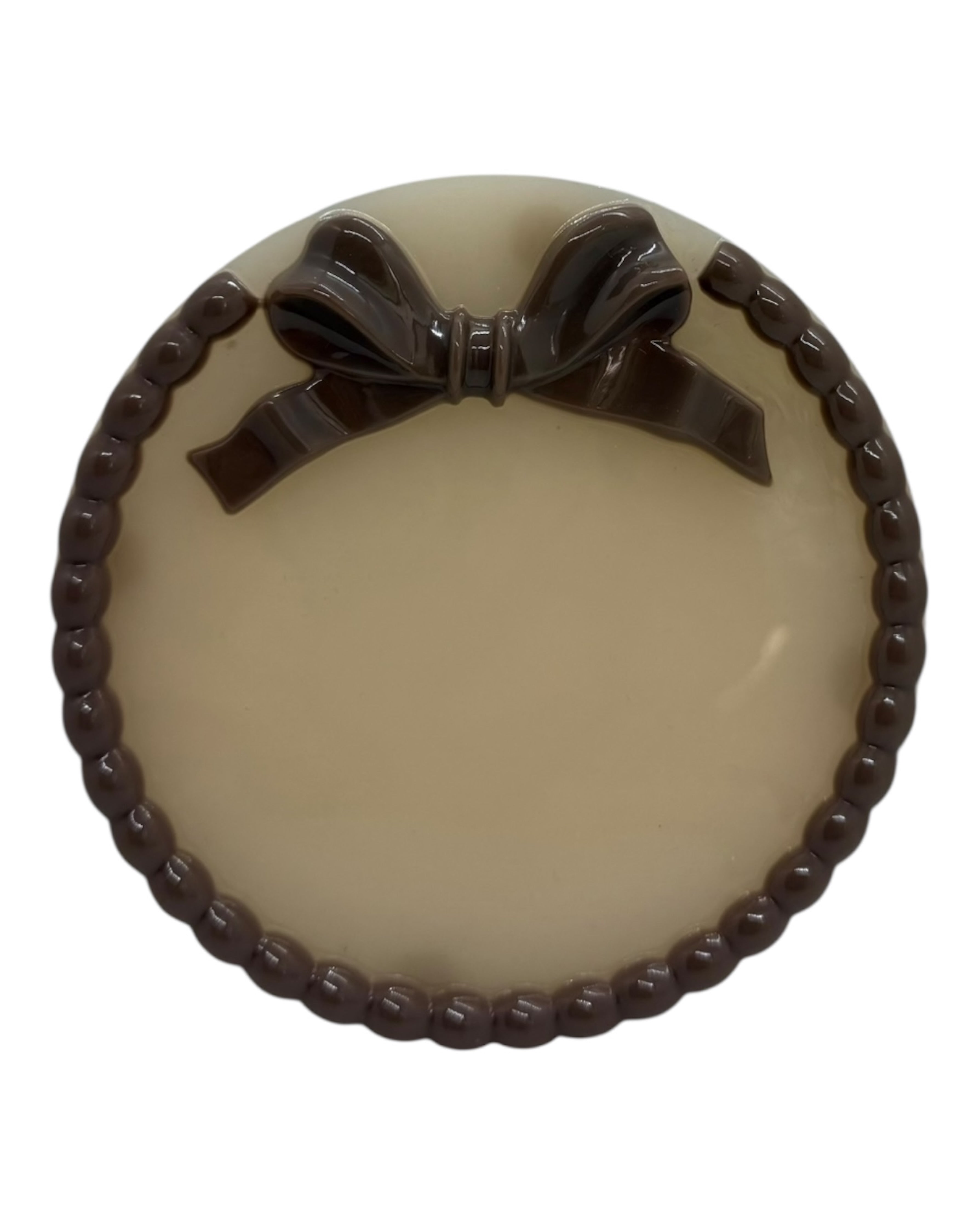 Plateau déco Ribbon’Rond en résine pour bougie ou bijoux, ambiance chaleureuse et stylée.