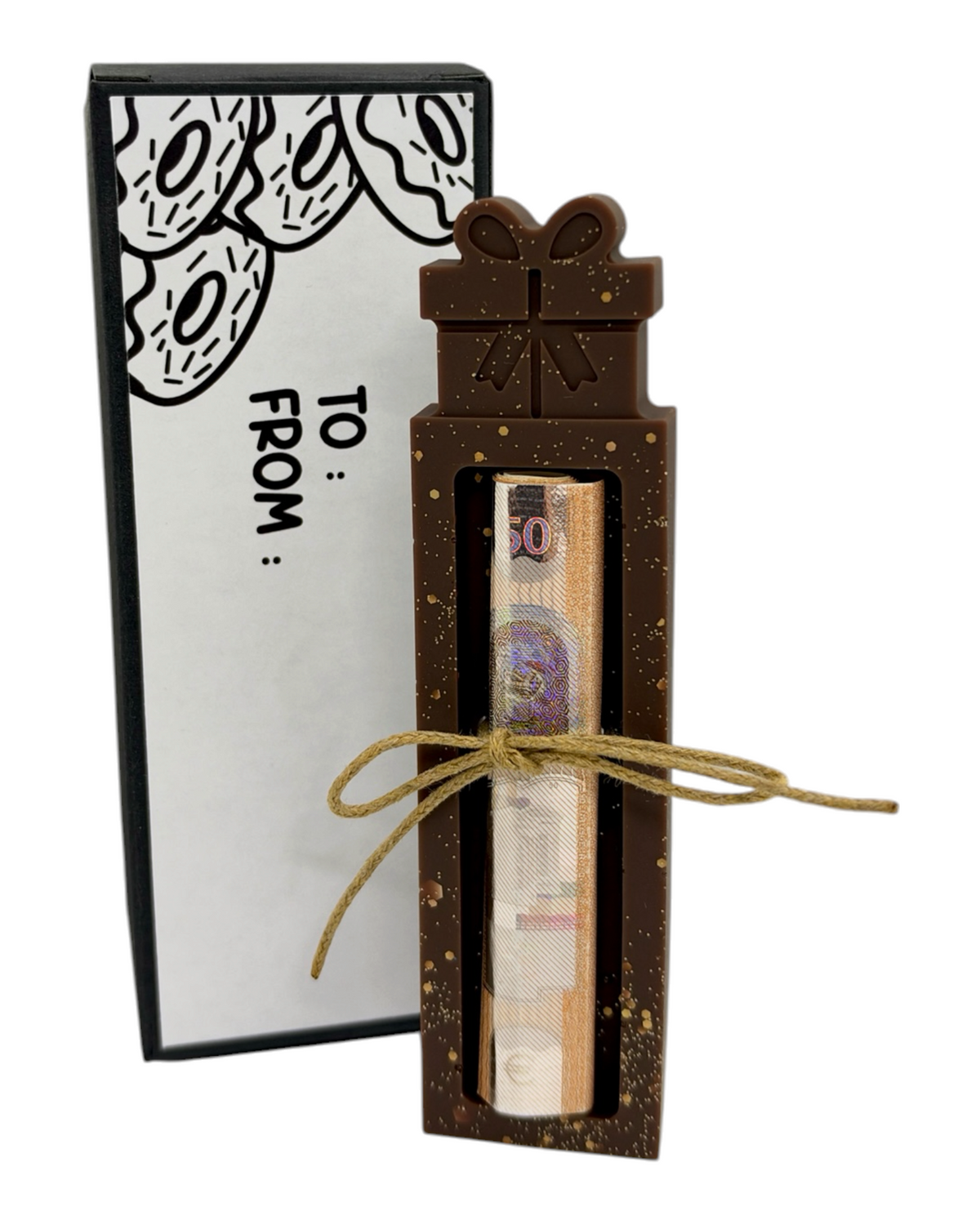 Support à billet en résine marron chocolat avec éclats dorés, contenant un billet roulé maintenu par une ficelle naturelle, accompagné de sa boîte noire et blanche.