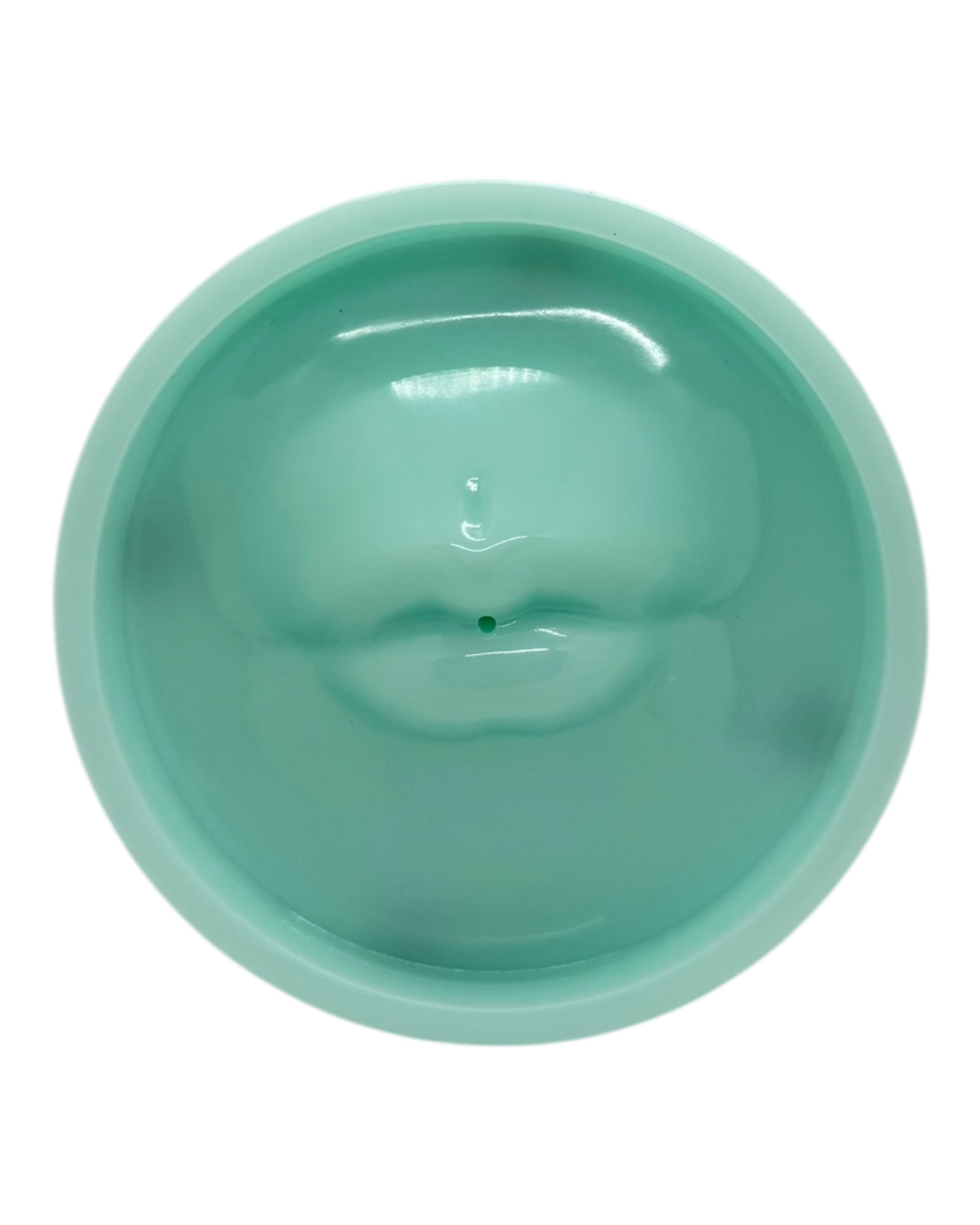 Porte-encens Bisou Bisou turquoise en résine époxy, réalisé à la main, au style décalé et graphique, avec une bouche sculptée qui maintient le bâton d’encens pour une ambiance apaisante