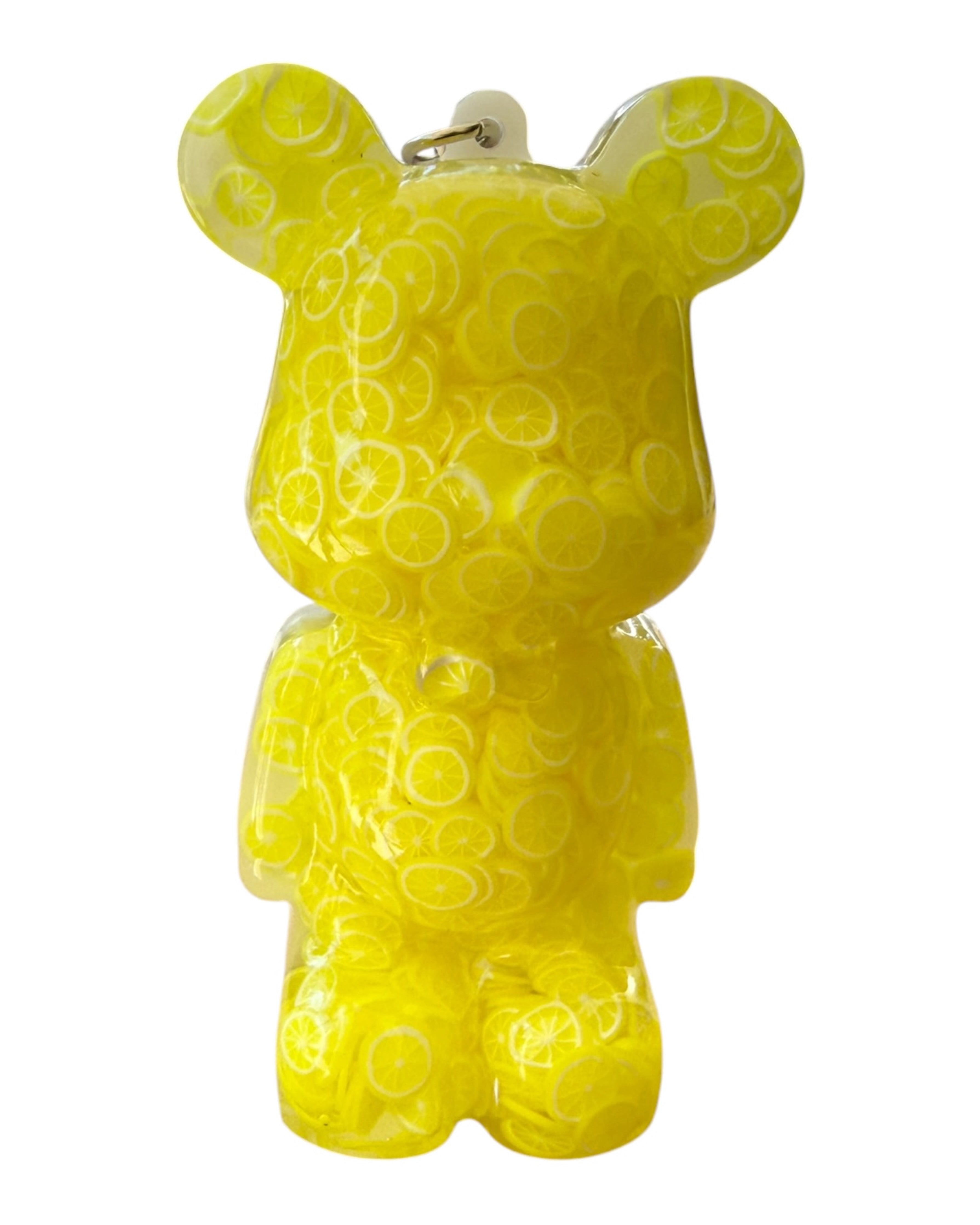 Porte-clés Teddy’z Lemon en résine époxy jaune glossy, création artisanale unique au look solaire et vitaminé, parfaite pour personnaliser un sac ou un trousseau de clés.