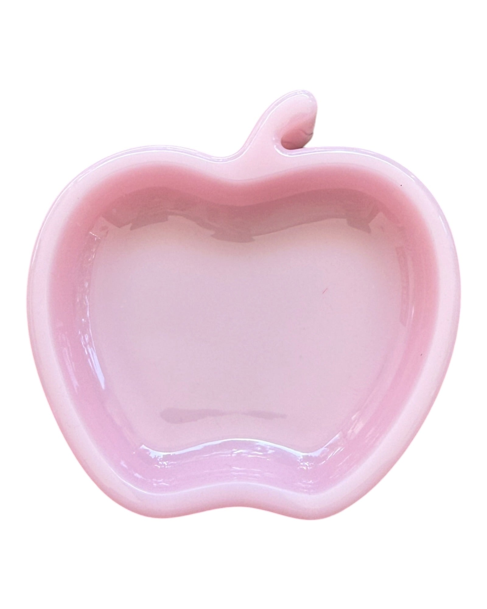 Vide-poche pomme rose clair en résine époxy glossy, objet décoratif original inspiré d'un fruit revisité façon déco pop.