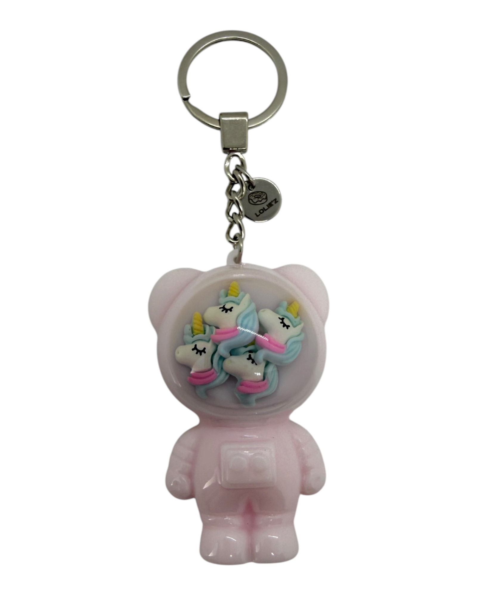 Porte-clés Izzy Cotton Wish de Lolie’z, ours astronaute rose décoré de licornes pastel et accompagné de sa médaille logo gravée.