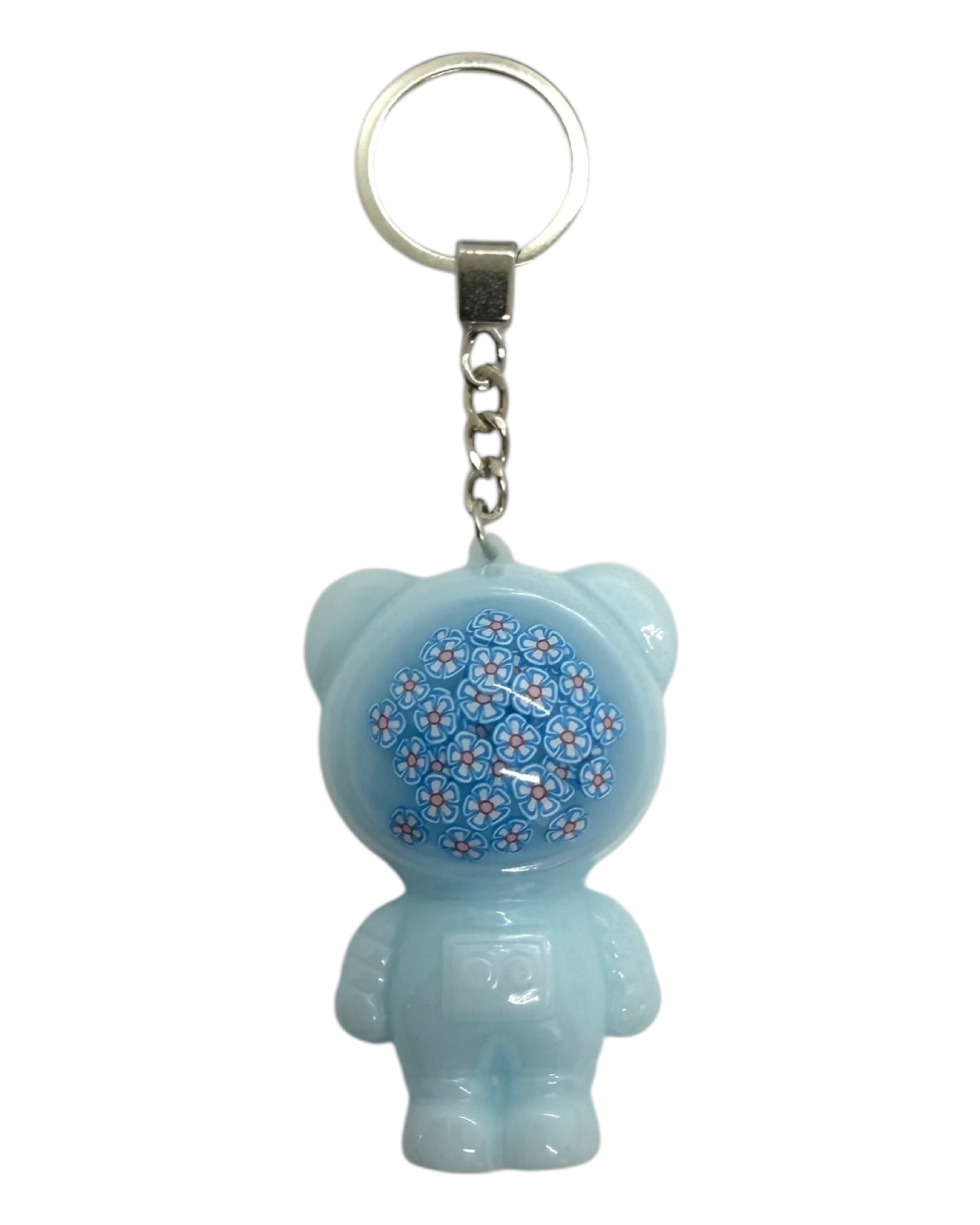 Izzy Ballroom accroché à un trousseau, un astro bear délicat évoquant l’élégance des bals et l’univers romantique Bridgerton.