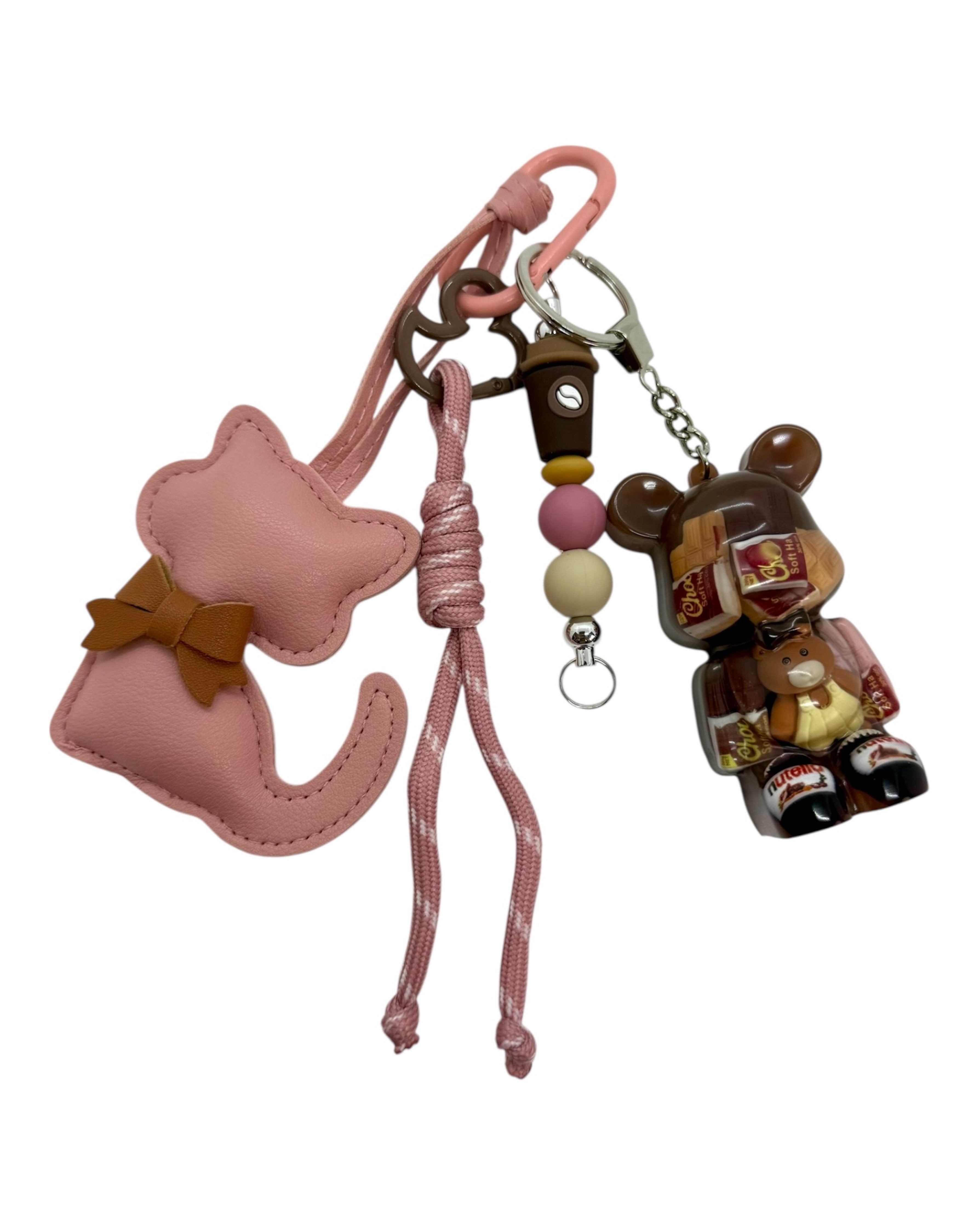 Grigri de sac Teddy’z Moi vouloir être un chat en résine époxy, rempli de chocolat, bijou unique fait main. Lolie'z