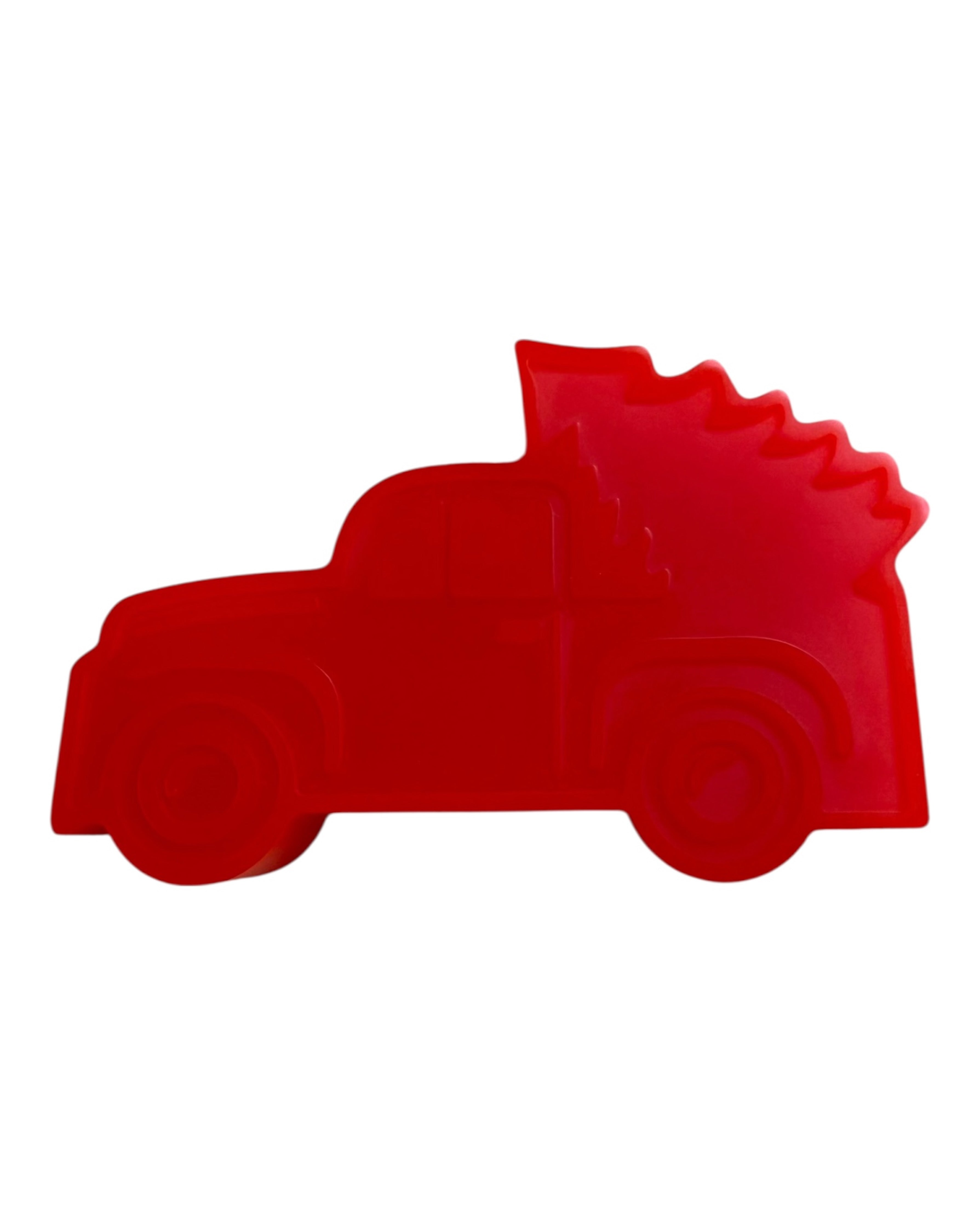 Pickup de Noël vintage avec sapin décoratif à l’arrière, style rétro américain, idéal pour ambiance de fête.Lolie'z