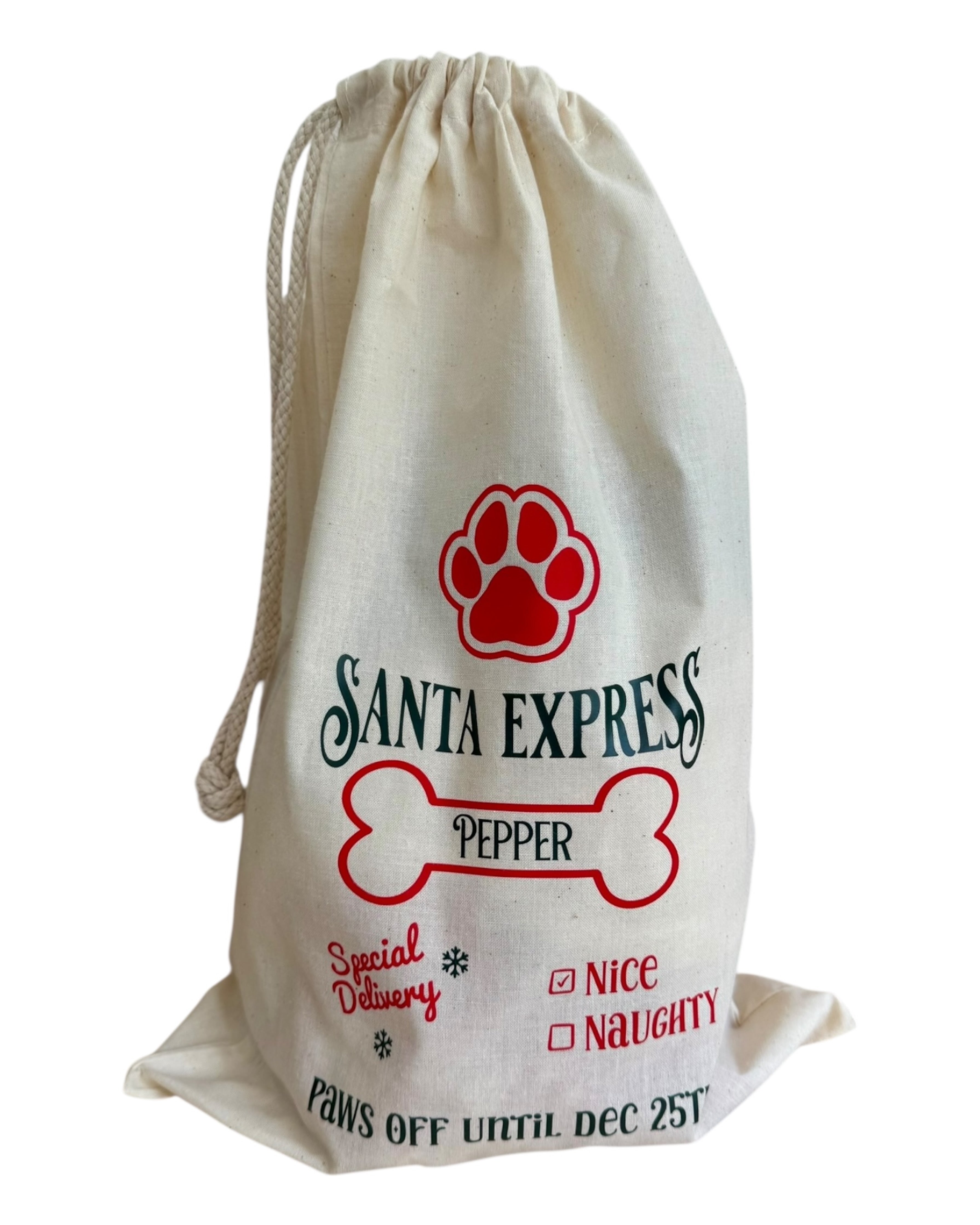 Pochon de Noël pour chien personnalisé avec son nom, parfait pour y glisser ses friandises ou jouets au pied du sapin. Lolie'z