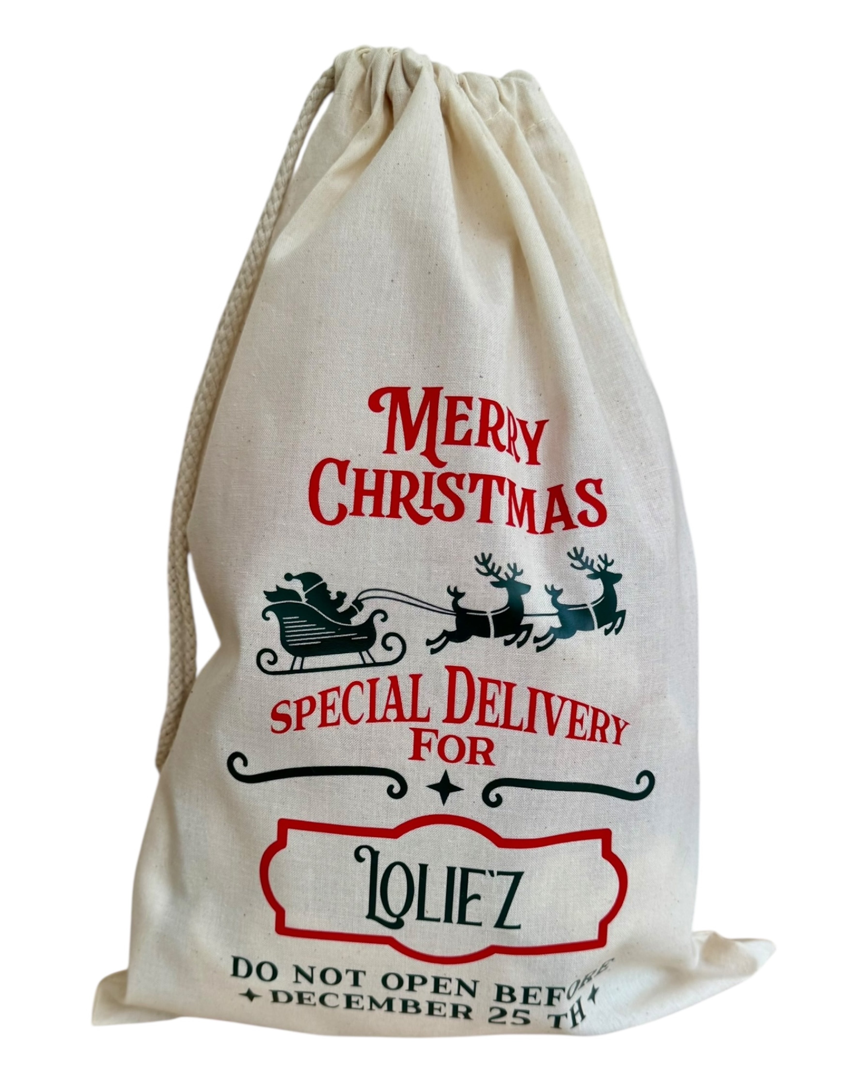 Pochon de Noël “Santa” personnalisé avec le prénom de l’enfant, parfait pour glisser ses cadeaux sous le sapin et ajouter une touche magique aux fêtes. Lolie'z