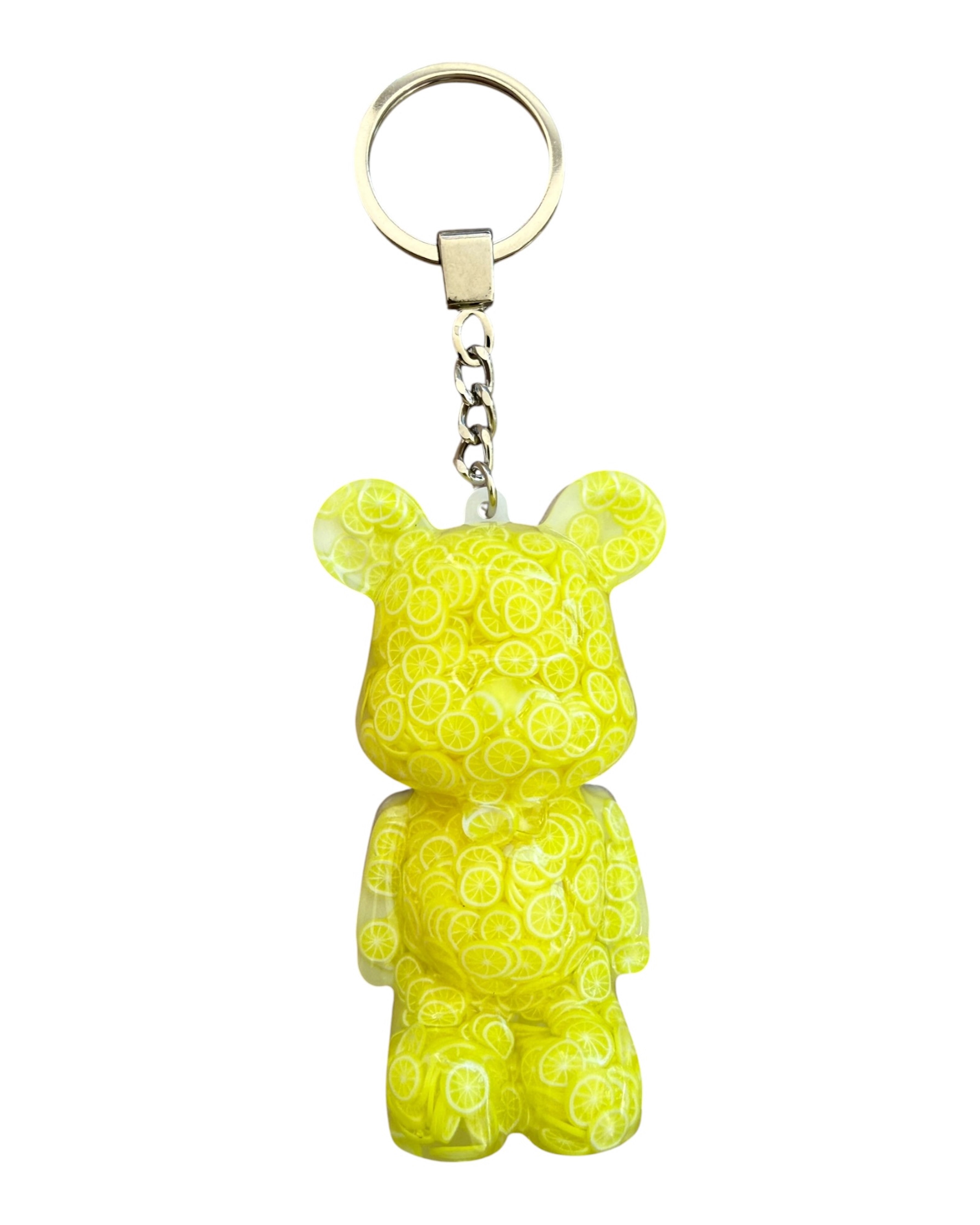 Teddy’z Lemon en résine époxy jaune brillante, porte-clés ours fait main inspiré du citron, accessoire coloré et lumineux au style estival.
