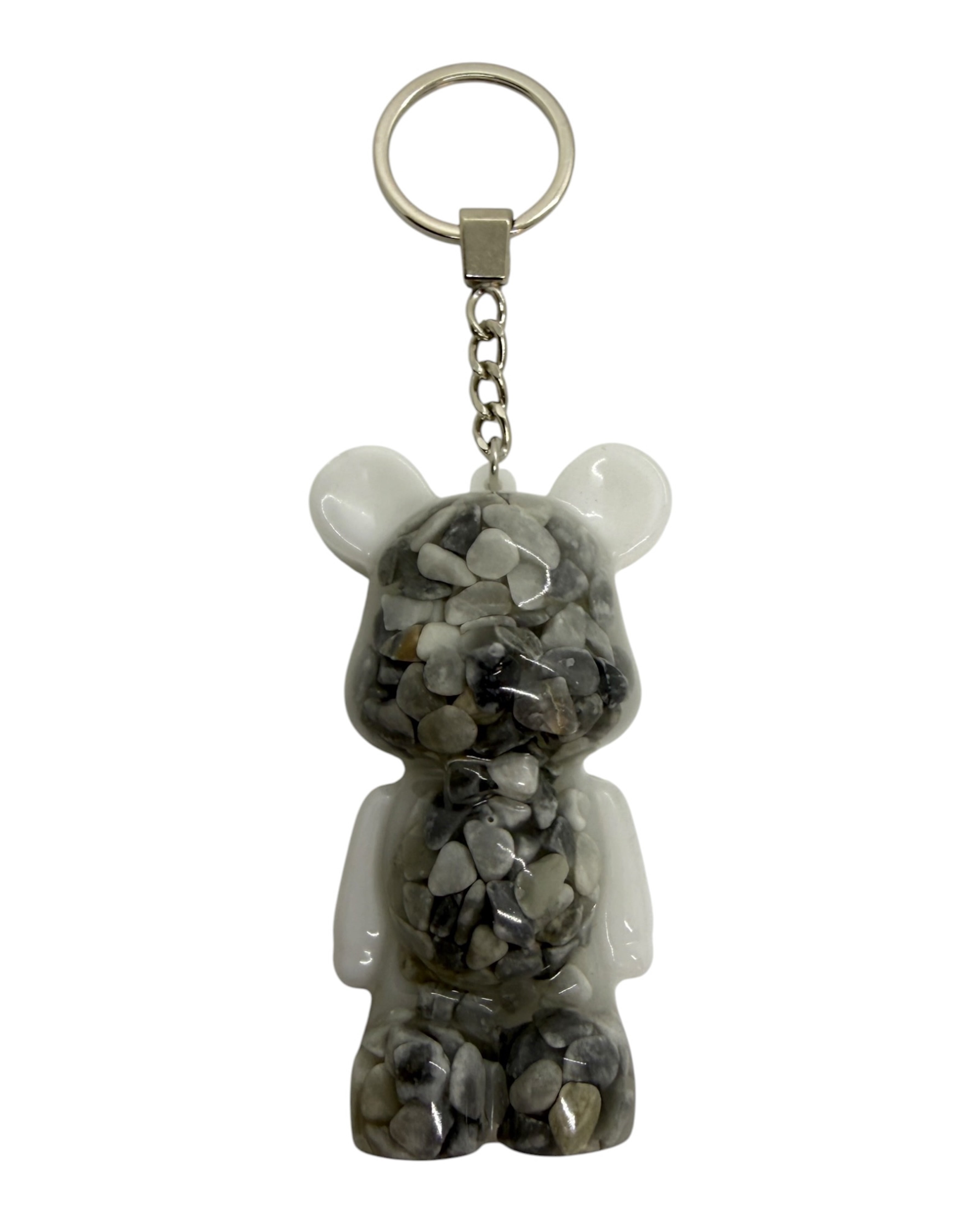 Porte-clé Teddy’z Stone Mood en résine époxy avec petits galets gris et blancs intégrés.
