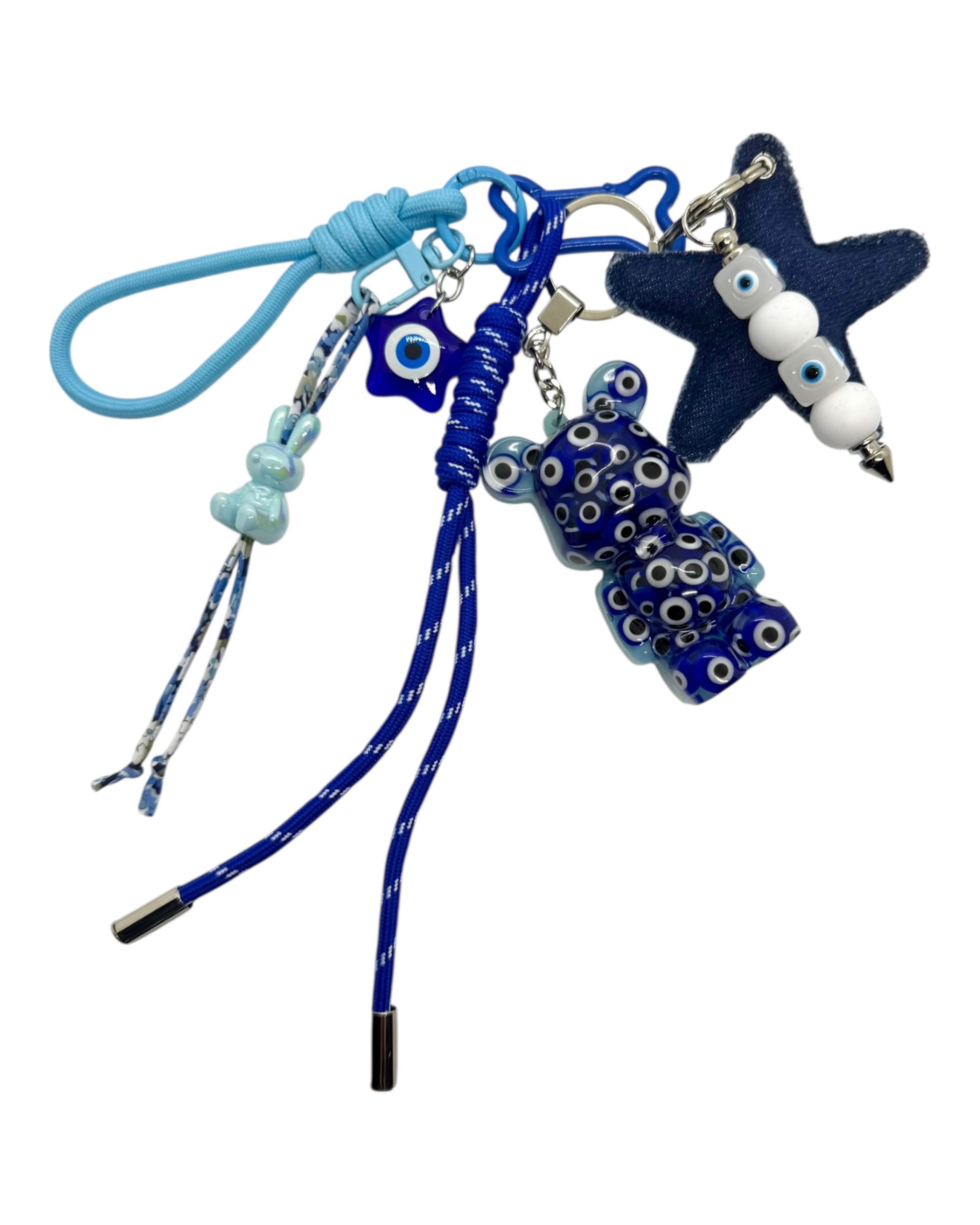 Teddy'z Mykonos fait main en resine epoxy, bleu mystique avec evil eyes, style grigri et bijou de sac protecteur. Lolie'z