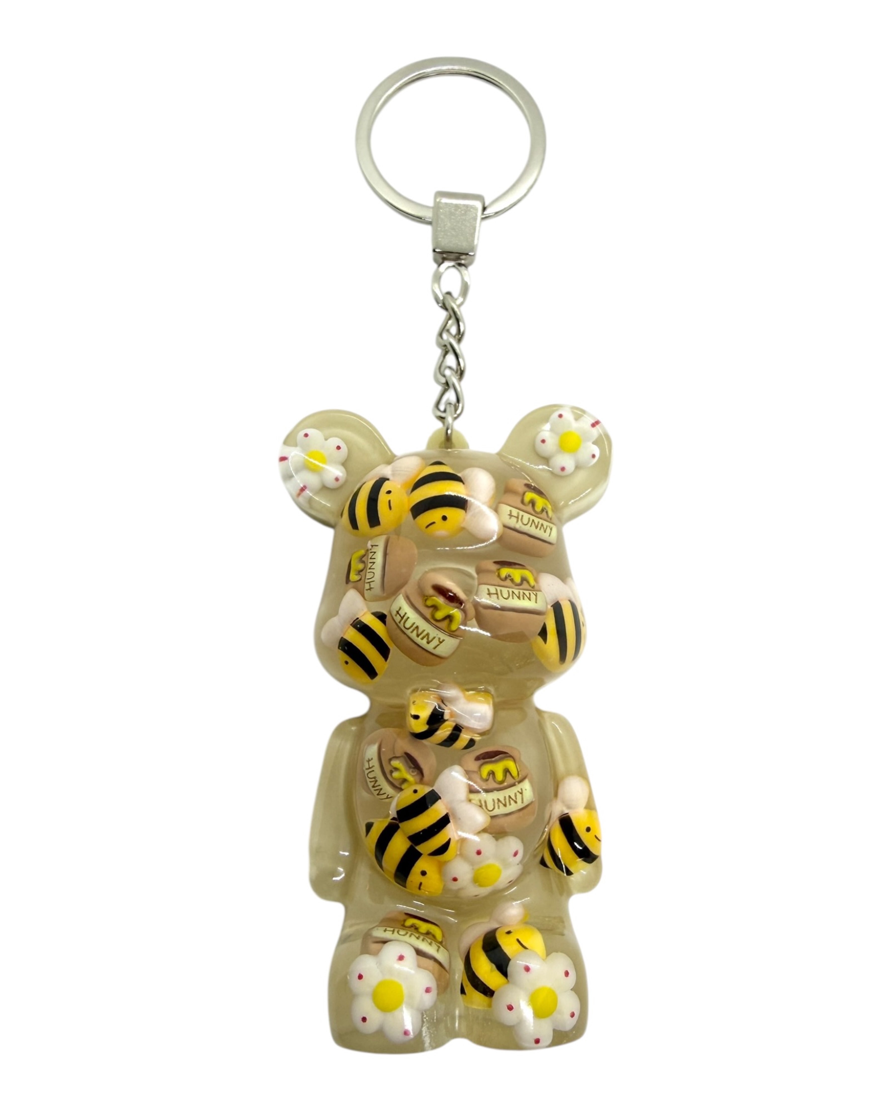 Teddy’z Bee Lovely en résine époxy avec abeilles, fleurs blanches et pots de miel.