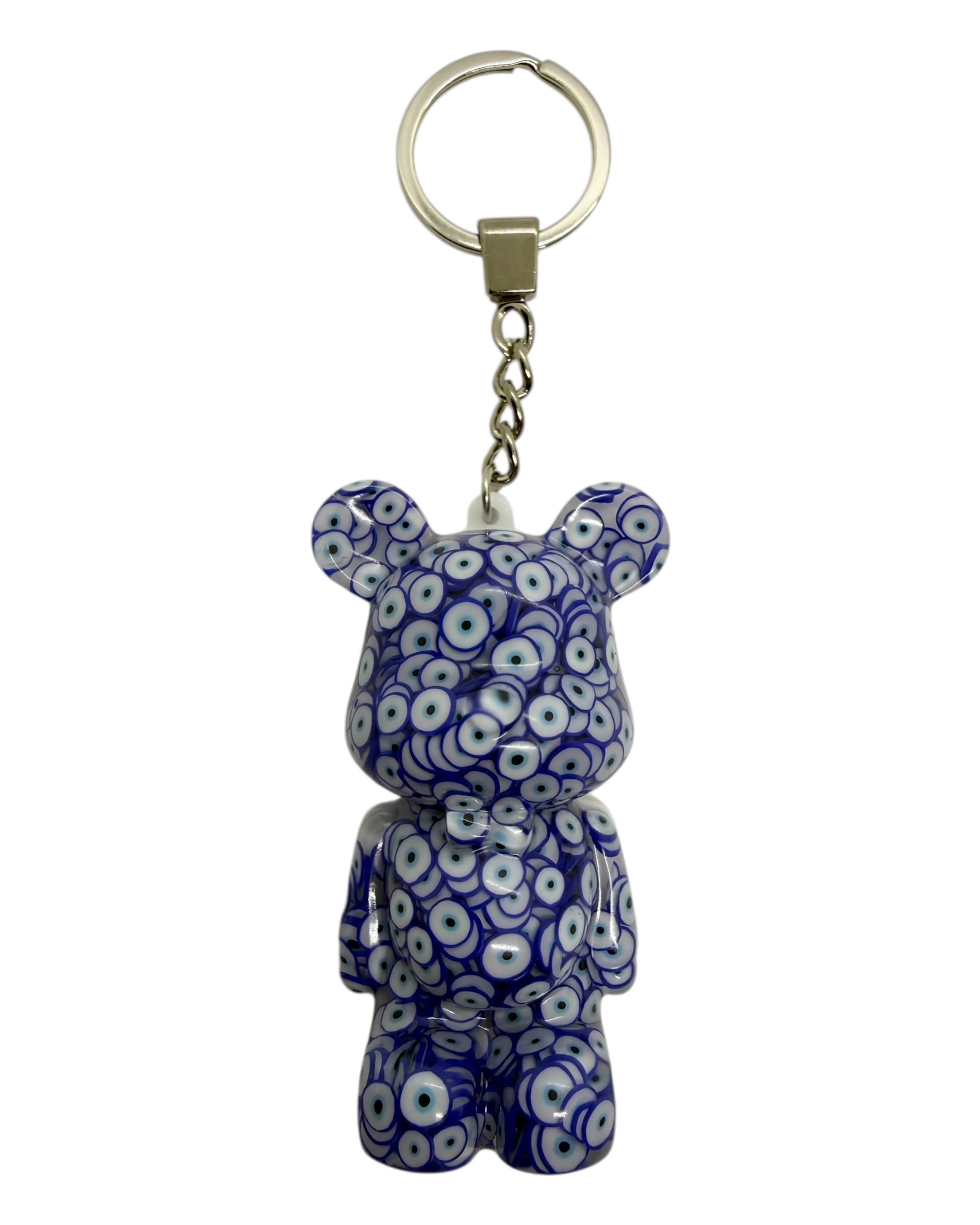Porte cles Teddy’z Talisman en resine epoxy fait main, accessoire symbolique inspire de la protection.