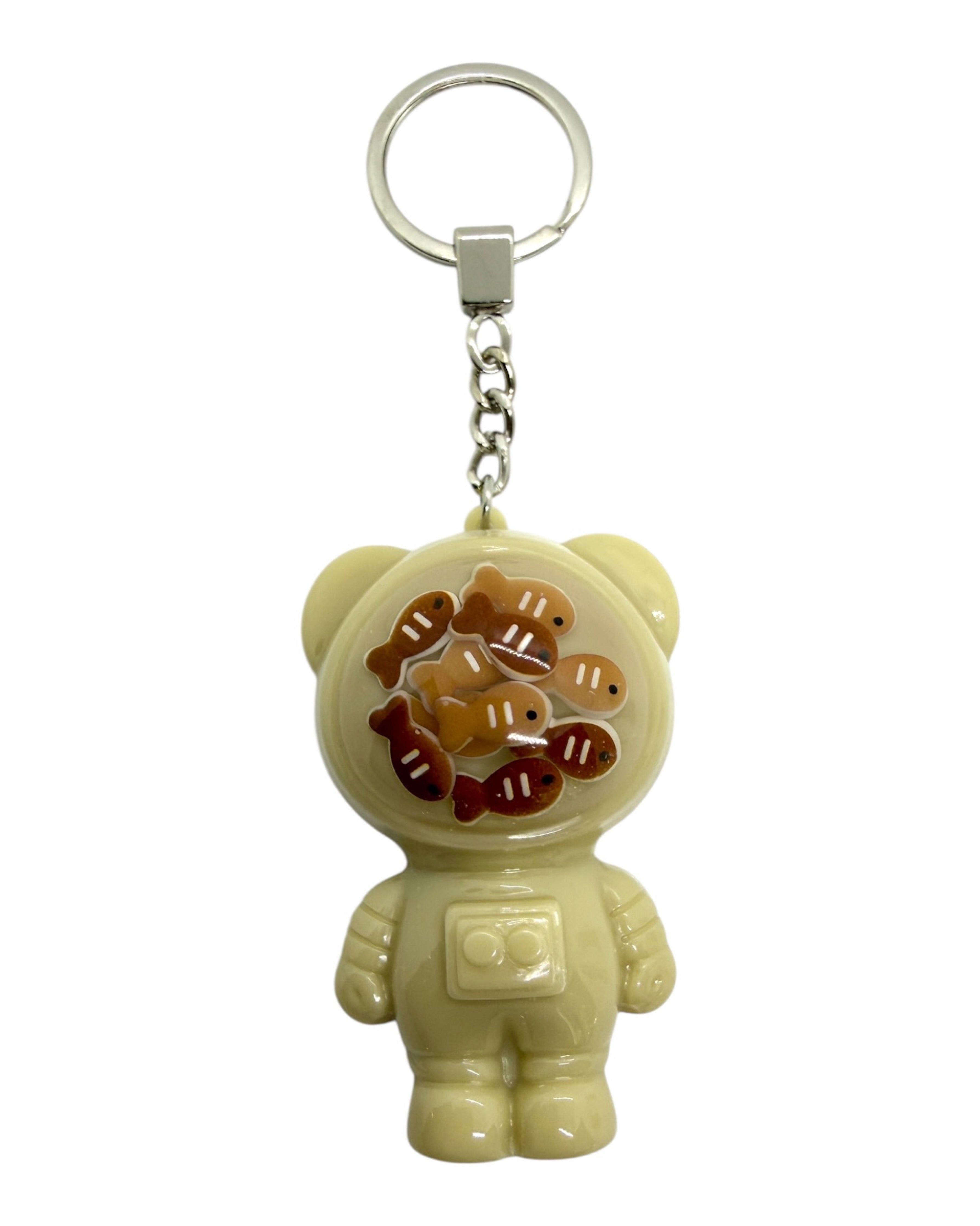 Ours Izzy Cosmic Fish vert doux avec poissons flottants effet cosmique.