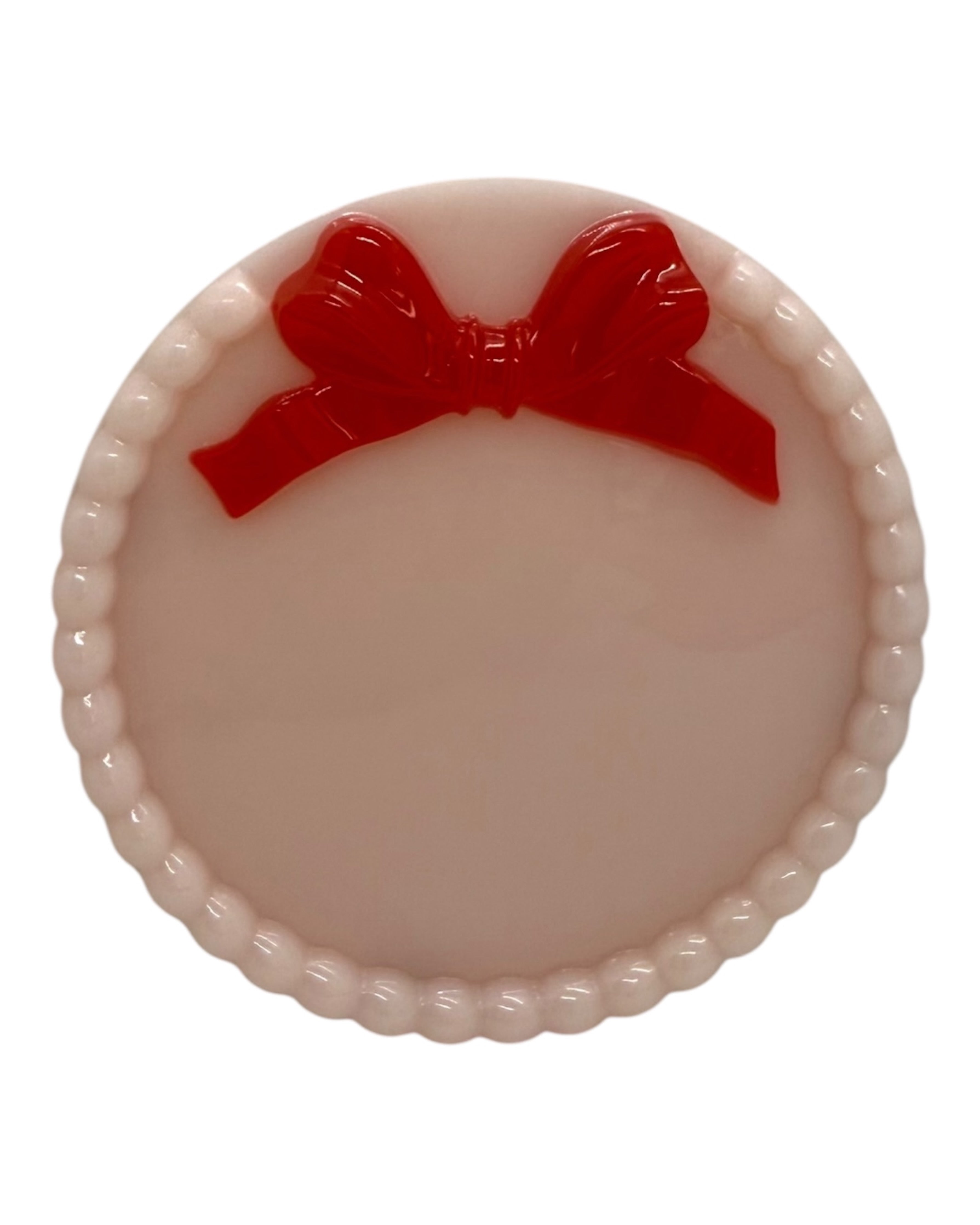 Ribbon’Rond utilisé comme vide-poche pour bijoux et petits objets, accessoire déco pratique et raffiné.