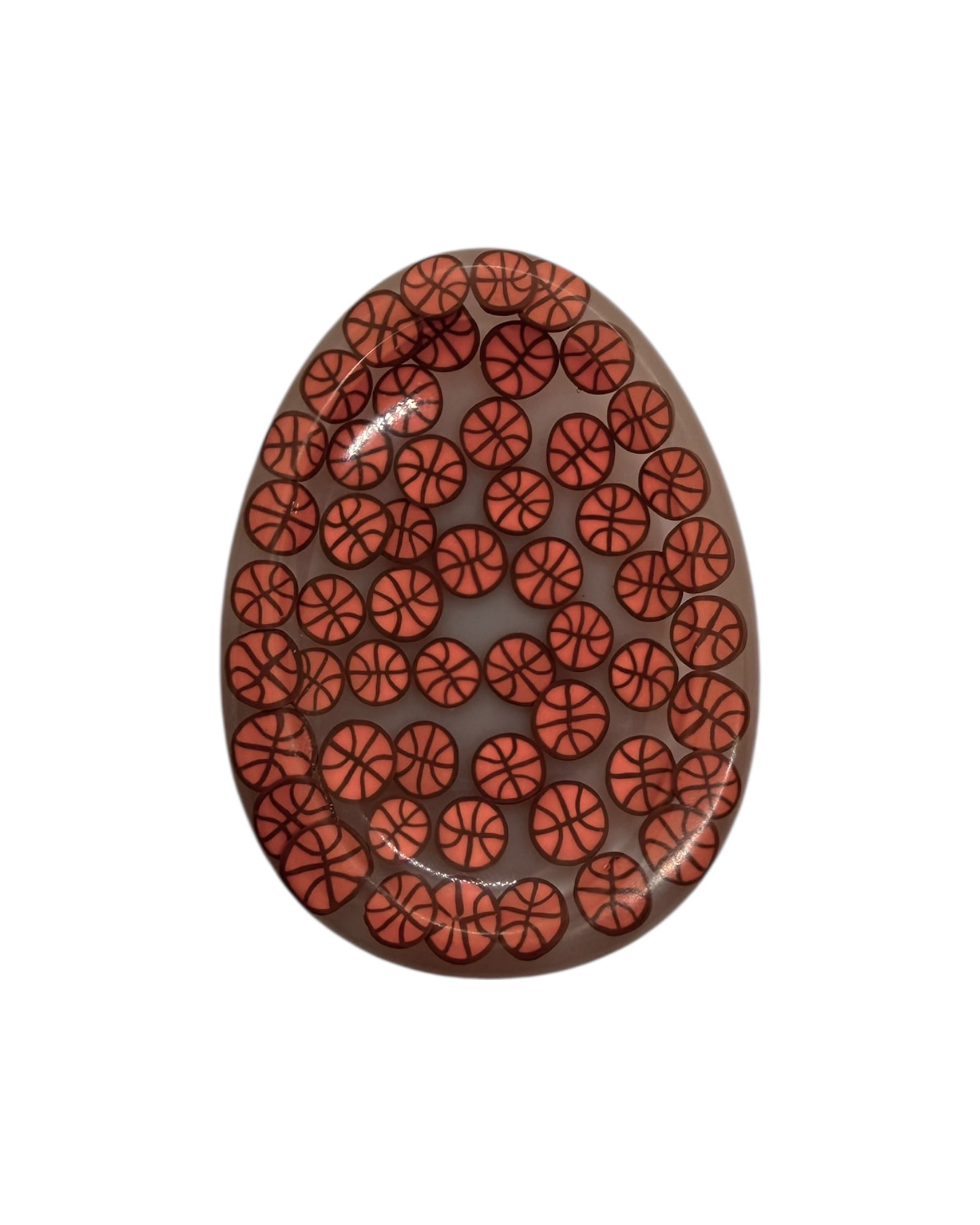 Galet anti-stress Flow en résine époxy artisanale, forme ergonomique et lisse, guidant le pouce dans un mouvement continu.